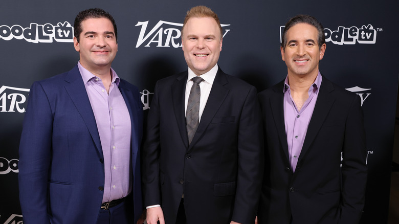 Hurwitz, Heald and Schlossberg suits smiling posing