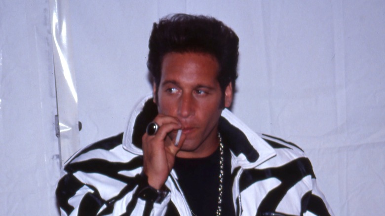 Andrew Dice Clay smoking cigarette