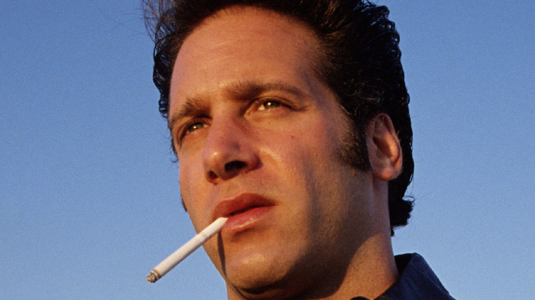 Andrew Dice Clay under blue sky