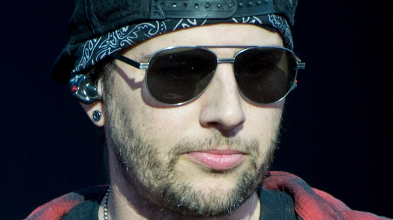 M. Shadows on stage
