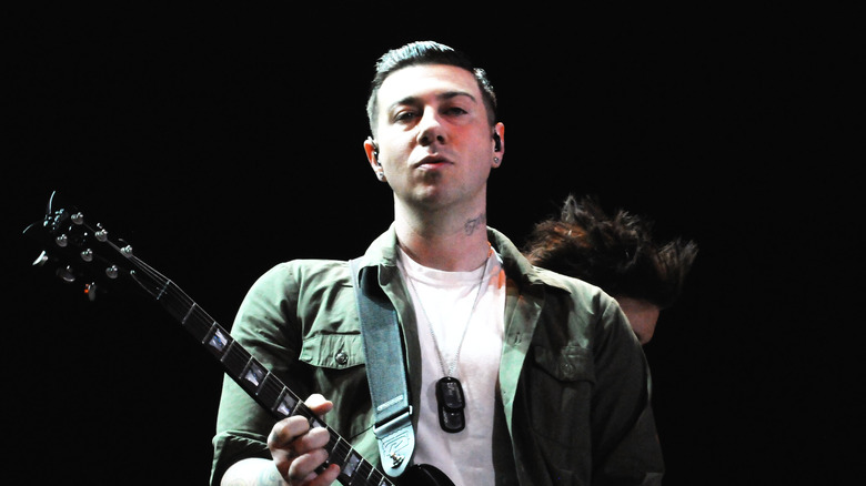 Zacky Vengeance playing guitar