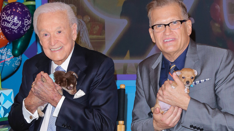 Bob Barker, Drew Carey hold puppies
