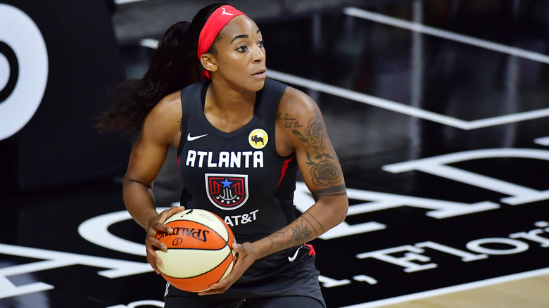Glory Johnson holding the ball