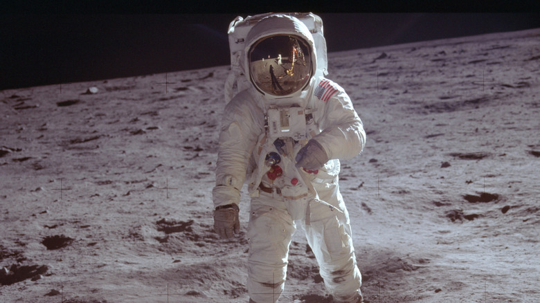 Buzz Aldrin standing on the moon