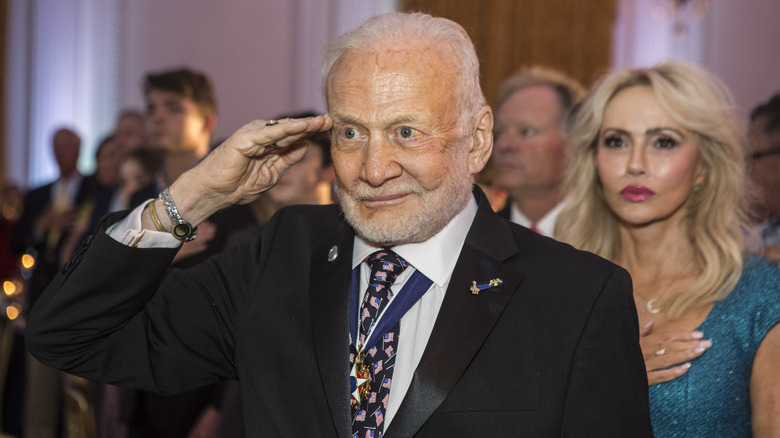 Buzz Aldrin giving a salute