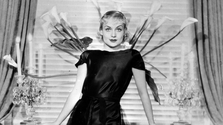 Carole Lombard posing