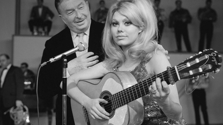Charo holding a guitar on Ed Sullivan