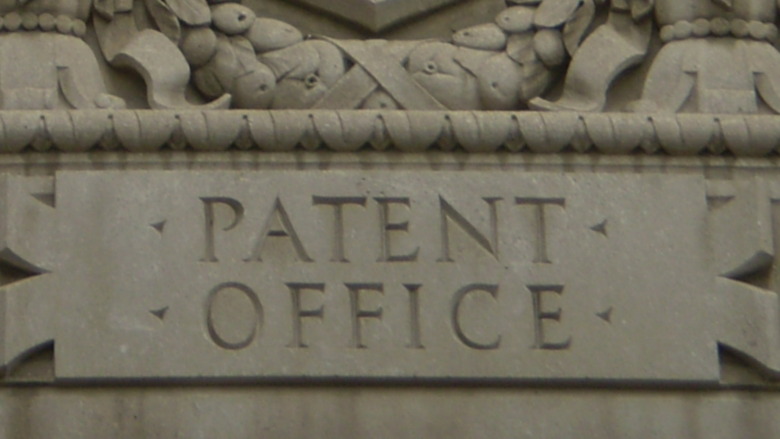 Cropped photo of the relief representing the Patent Office at the Herbert C. Hoover Building