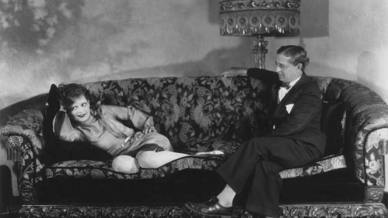 Clara and Robert Bow on a couch