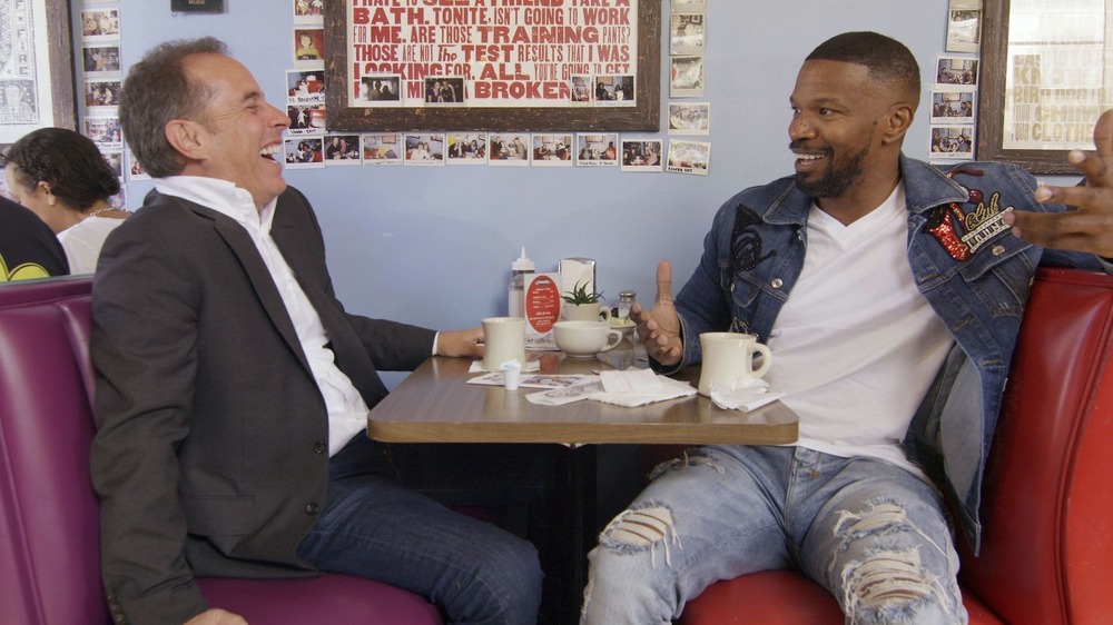 Jerry Seinfeld and Jamie Foxx laughing 