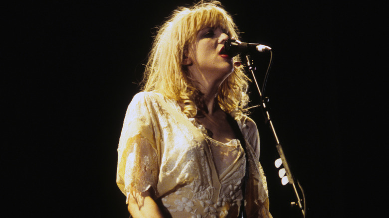 Courtney Love babydoll dress at mic