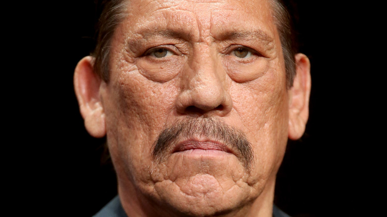 Danny Trejo, staring and unsmiling