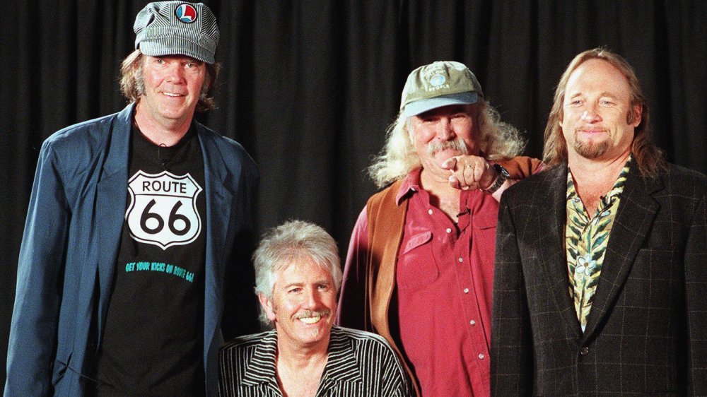 Crosby, Stills, Nash & Young smiling