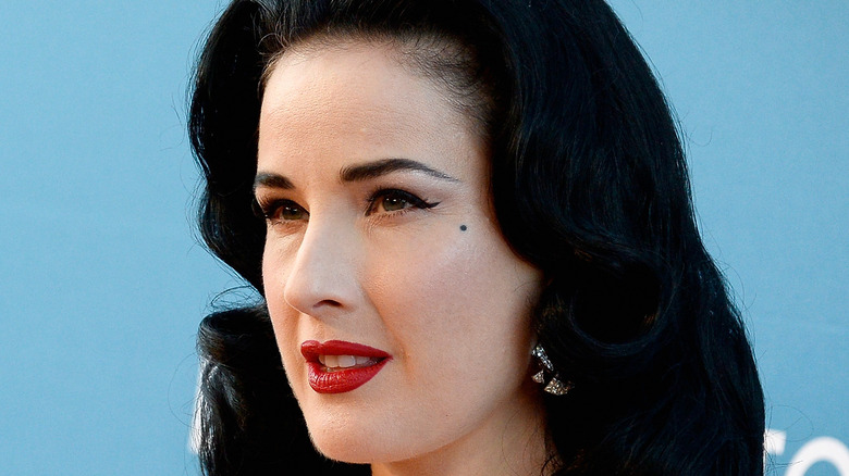 Dita Von Teese posing for photos