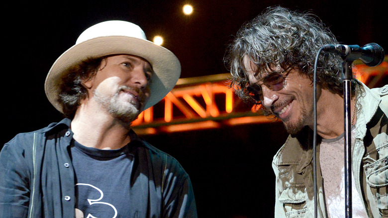 Eddie Vedder and Chris Cornell on stage smiling