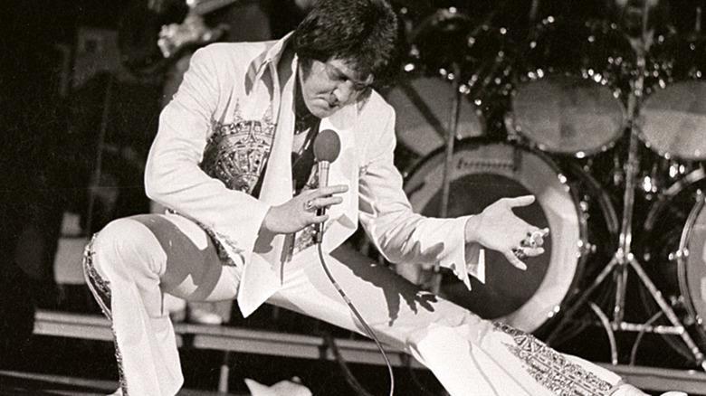 elvis striking pose on stage