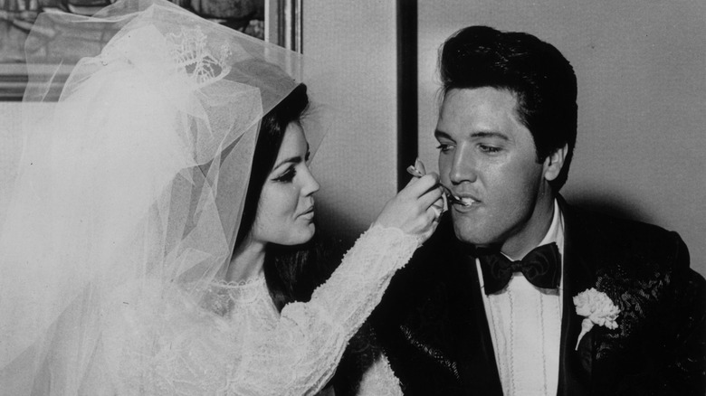 Priscilla and Elvis Presley at their wedding