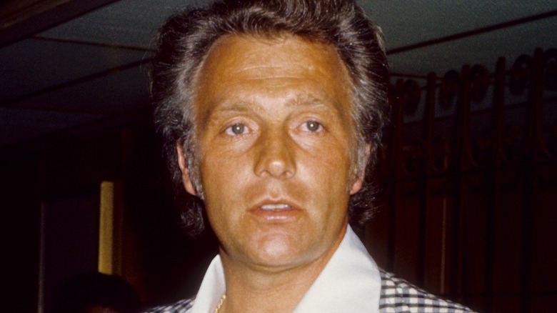 Evel Knievel in a checkered blazer