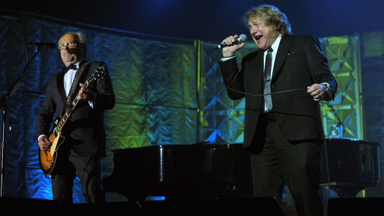 mick jones lou gramm performing