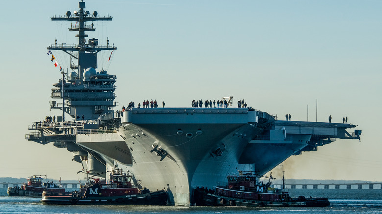 A US Navy ship idles in the water