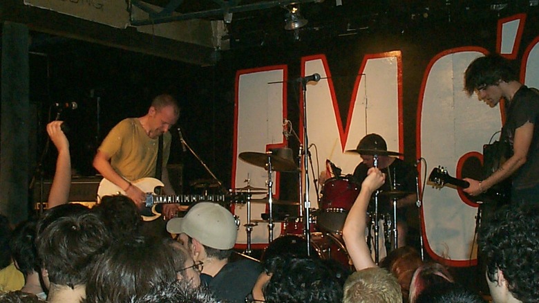 Fugazi performing on stage