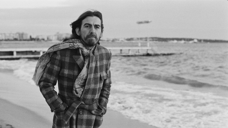 George Harrison on the beach in 1976