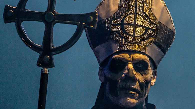 ghost singer with mitre and cross