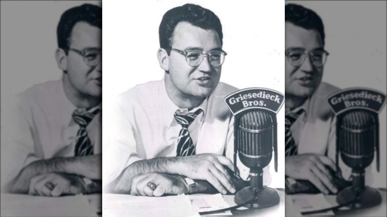 Harry Caray behind a microphone