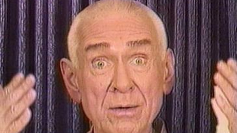 Marshall Applewhite gesturing to camera