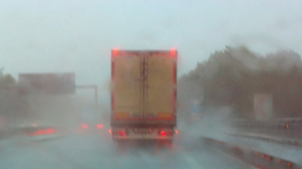 Truck on a highway in bad weather