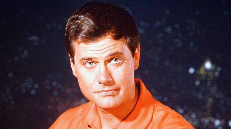 Larry Hagman glances up