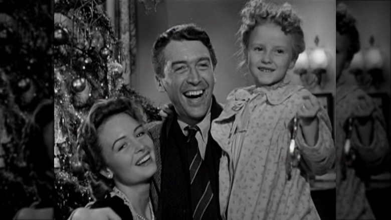 Donna Reed, Jimmy Stewart, and Karolyn Grimes in "It's a Wonderful Life"