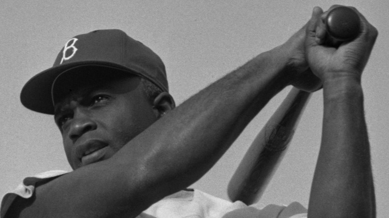 Jackie Robinson taking a swing