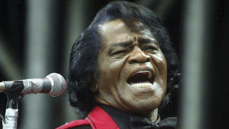 James Brown singing at mic 