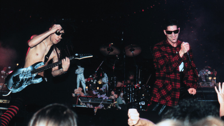Jane's Addiction performing on stage in the early 1990s