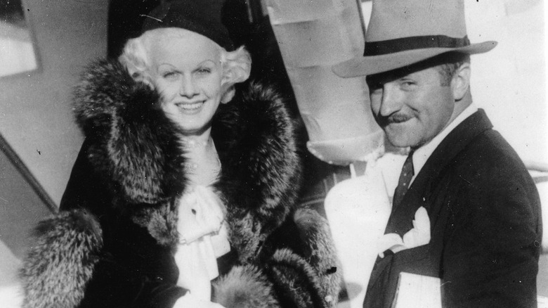 Jean Harlow smiling with Harold Rosson