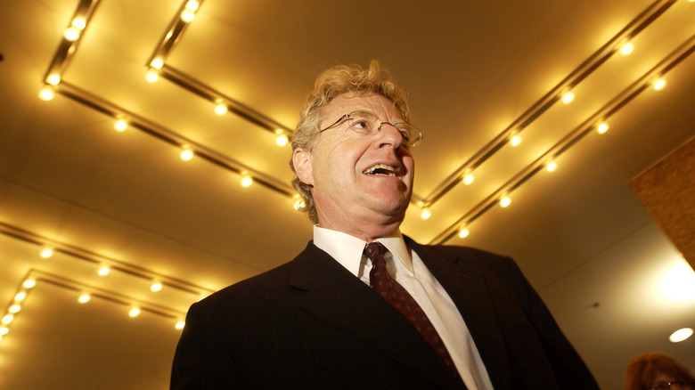 Jerry Springer in a hotel lobby