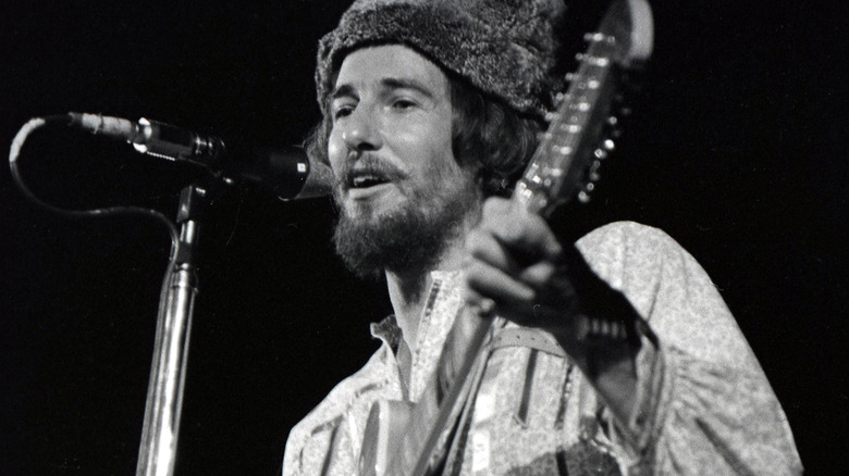 John Phillips playing guitar