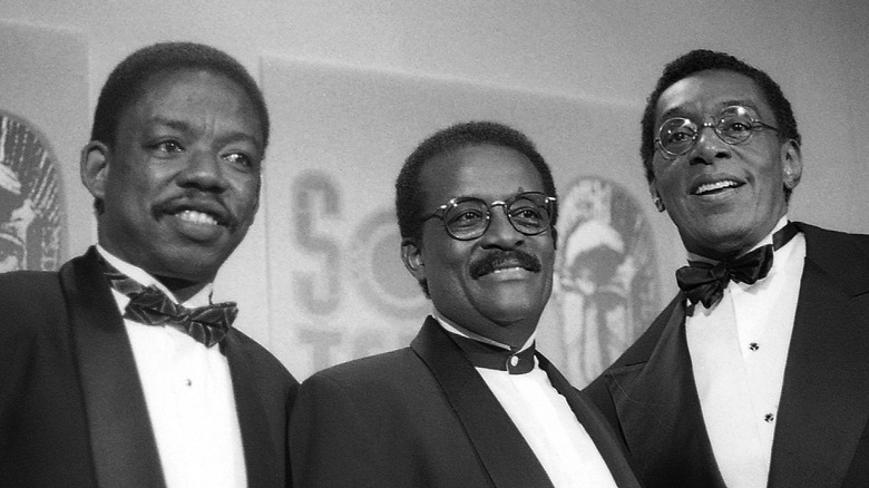 Carl Douglas, Johnnie Cochran, and TV host Don Cornelius pose for photos