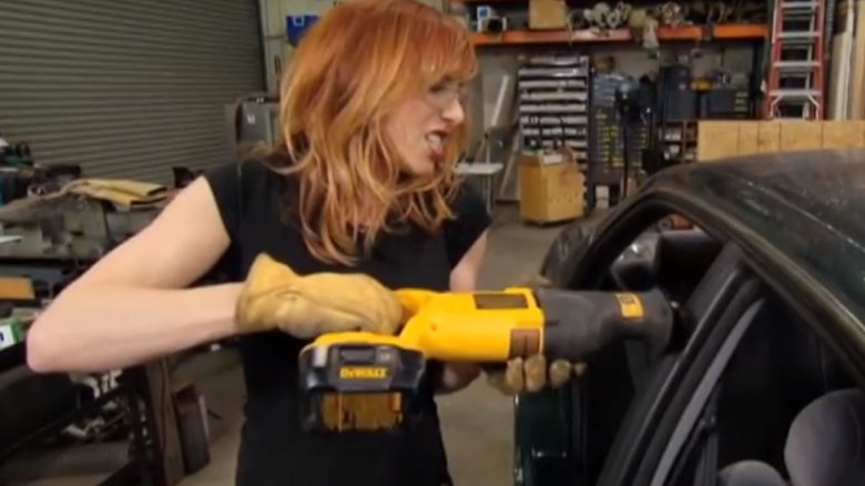 Kari Byron cutting into car