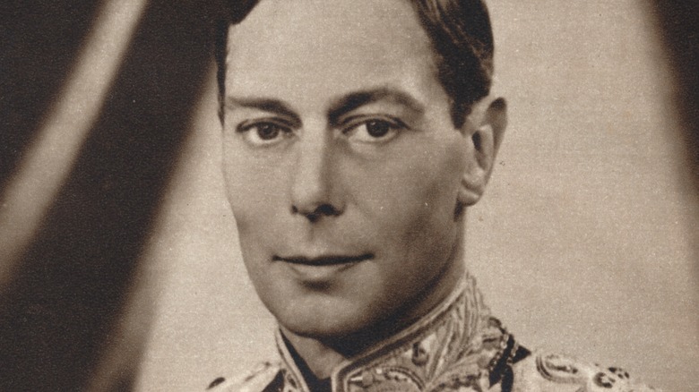 George VI faces the camera in full ceremonial dress