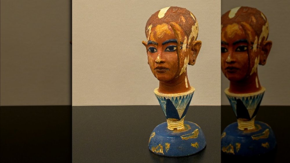 Tutankhamun emerging from a lotus flower