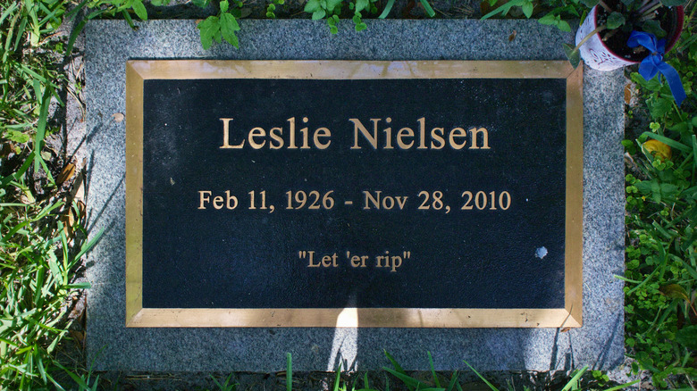 Leslie Nielsen's Gravestone and blue flower