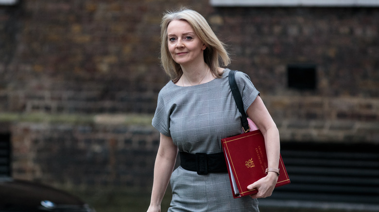 Liz Truss in a grey romper