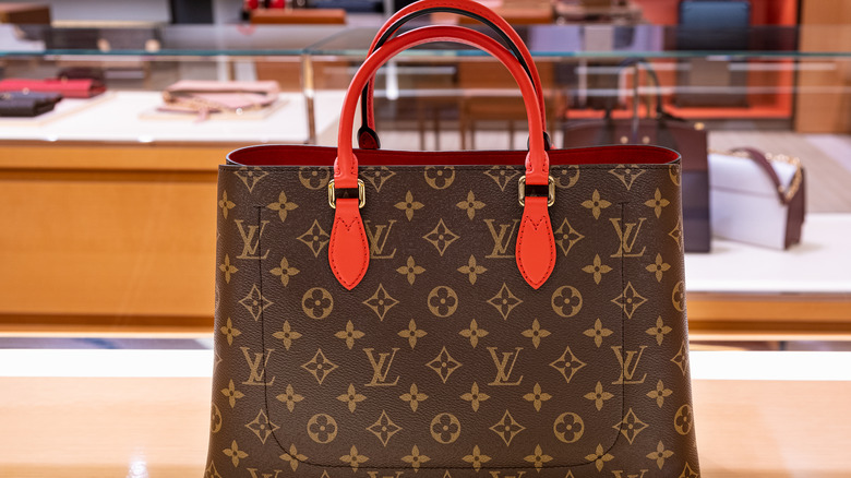 Louis Vuitton Handbag on table