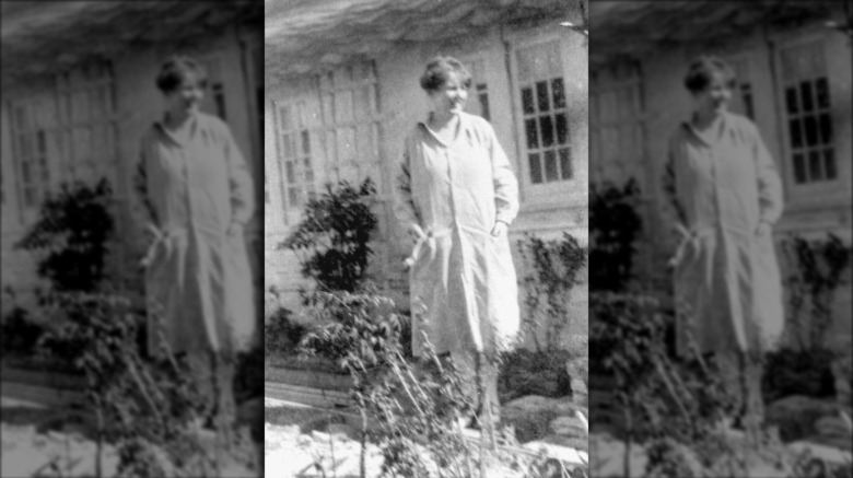 Marjory Stoneman Douglas standing in front of building