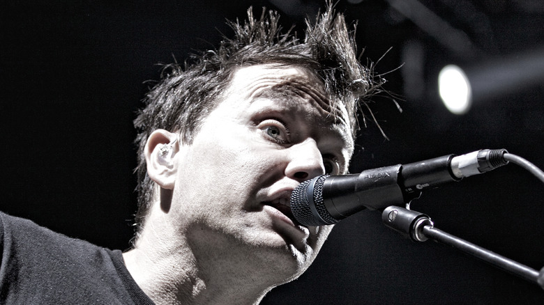 Mark Hoppus performing on stage