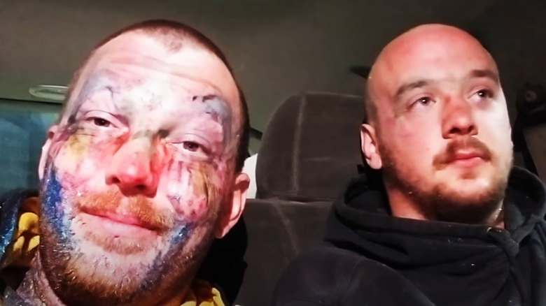 Two men sitting in a car