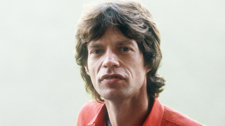 young mick jagger smiling