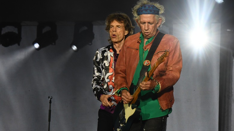 mick and keith performing on stage
